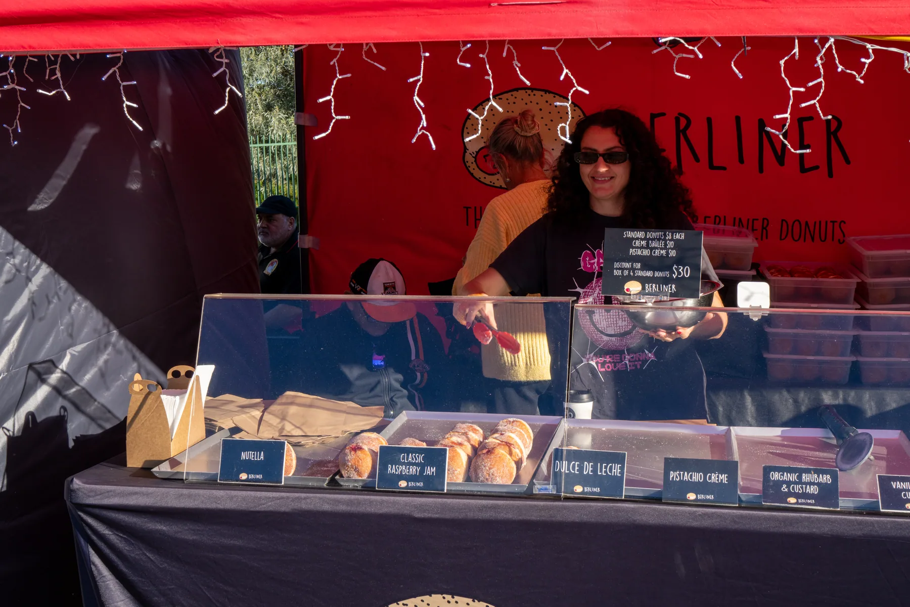 Dessert stall photographed at a food market