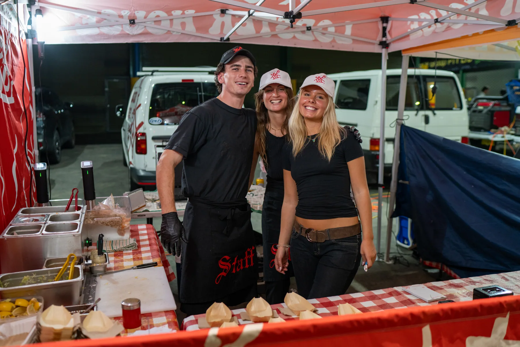Food truck vendor team photographed at their stall