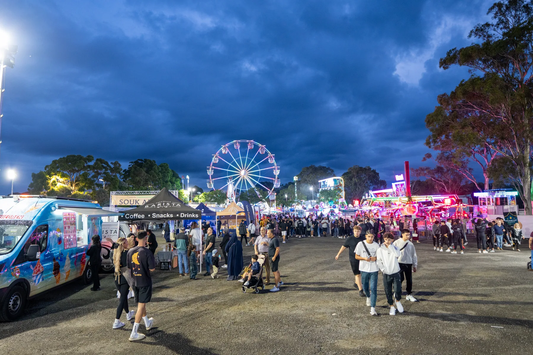 Wide evening view of a community food event