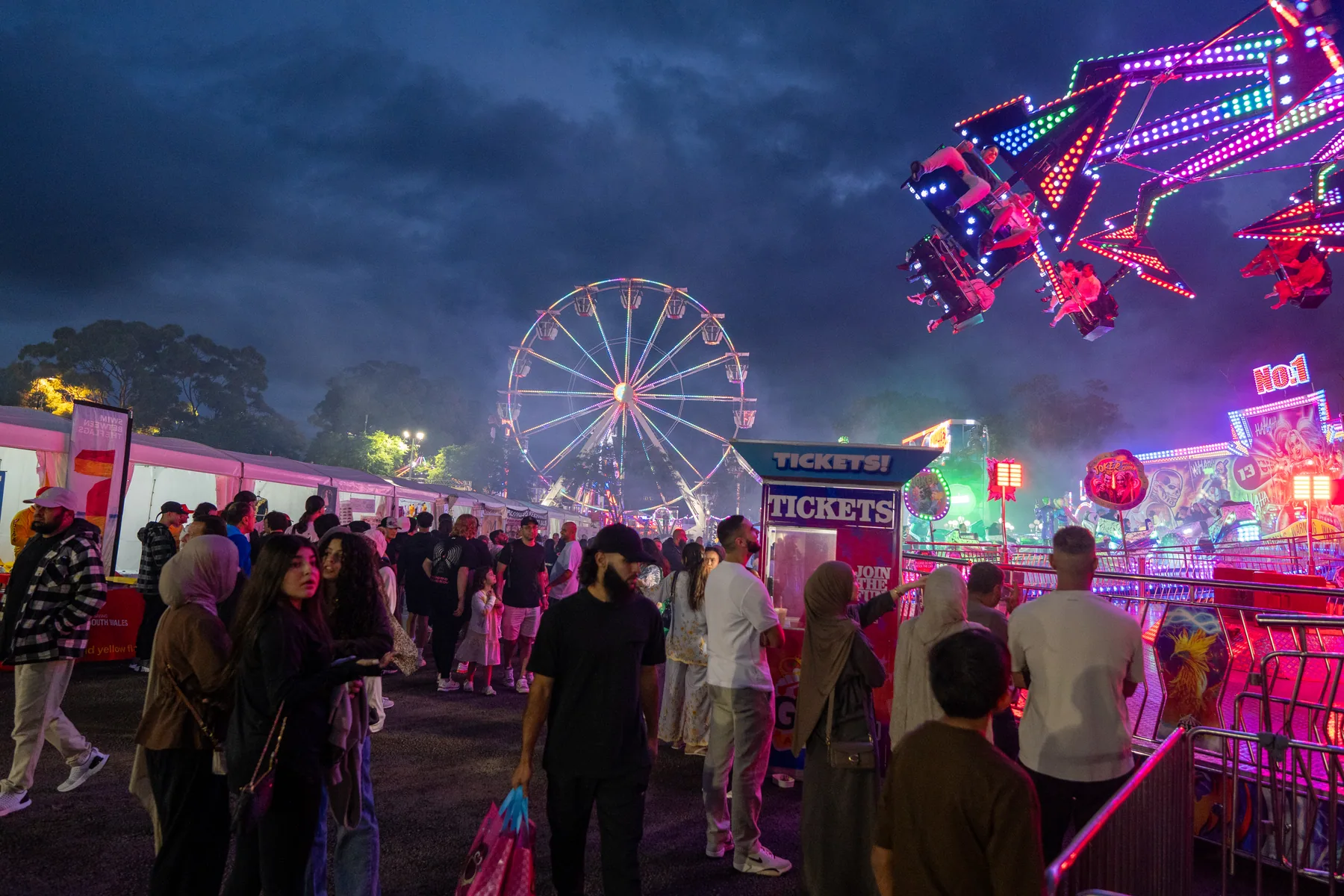Night event rides and lights photographed for trailer-style coverage